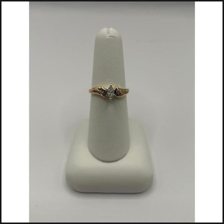 14ky MQ center round accent diamond engagement ring