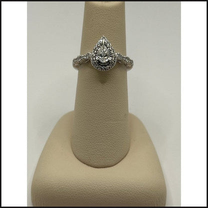 14kw 5/8ctw pear shape diamond halo engagement ring