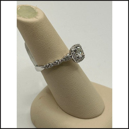 14kw 5/8ctw diamond cushion halo engagement ring