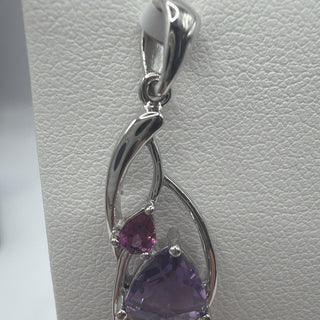 Sterling silver trillion amethyst crossover pendant with pink accent stone
