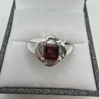 Sterling silver garnet ring, square-cut garnet in twisted open frame