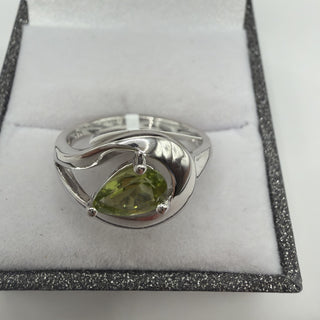 Sterling silver pear-cut peridot ring with swirl design