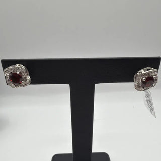 Sterling silver garnet halo stud earrings with white topaz