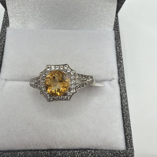 Sterling silver golden citrine halo ring with white topaz split shank