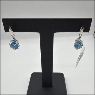 Sterling silver blue topaz drop earrings with white topaz accents