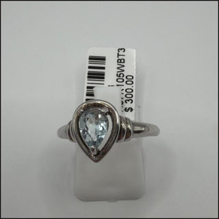 Sterling silver blue topaz pear ring, 0.71 ct, open teardrop setting