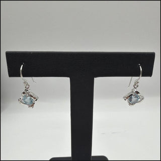 Sterling silver blue topaz drop earrings with twisted ribbon frames