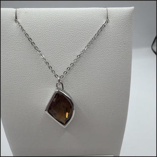 Sterling silver chocolate quartz necklace with asymmetric bezel setting
