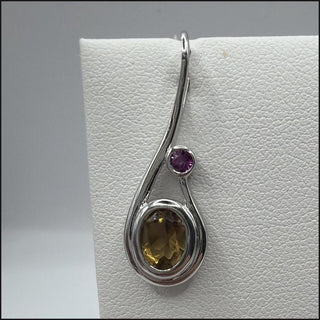 Sterling silver chocolate quartz teardrop pendant with pink accent stone
