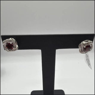 Sterling silver garnet halo stud earrings with white topaz