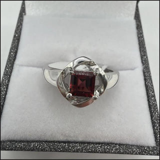 Sterling silver garnet ring, square-cut garnet in twisted open frame