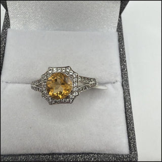 Sterling silver golden citrine halo ring with white topaz split shank