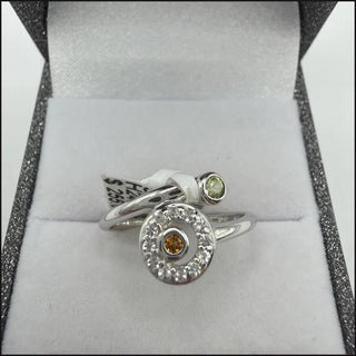 Sterling silver bypass ring with peridot, citrine and white topaz circle