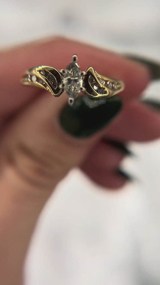 14ky MQ center round accent diamond engagement ring